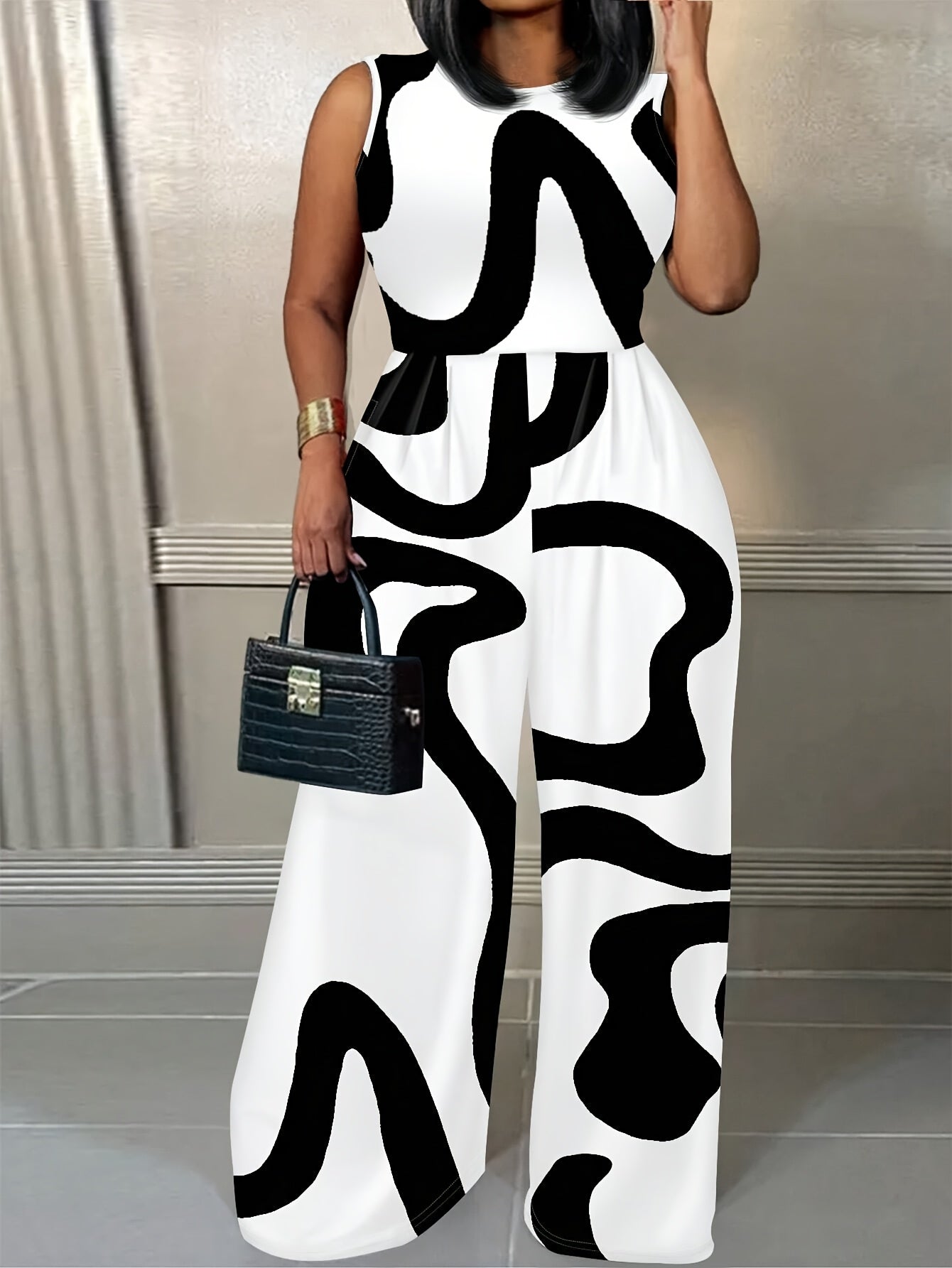 Women's Plus Size Geometric Print Jumpsuit - Casual Sleeveless Wide-Leg Design, Black & White Abstract Pattern, Polyester Knit Fabric, Machine Washable, Spring/Summer Collection, Casual Summer Wear | Sleeveless Jumpsuit | Flowing Fit
